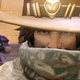 A screenshot of damage hero Reaper sneaking up behind the newly named cowboy, Cole Cassidy.